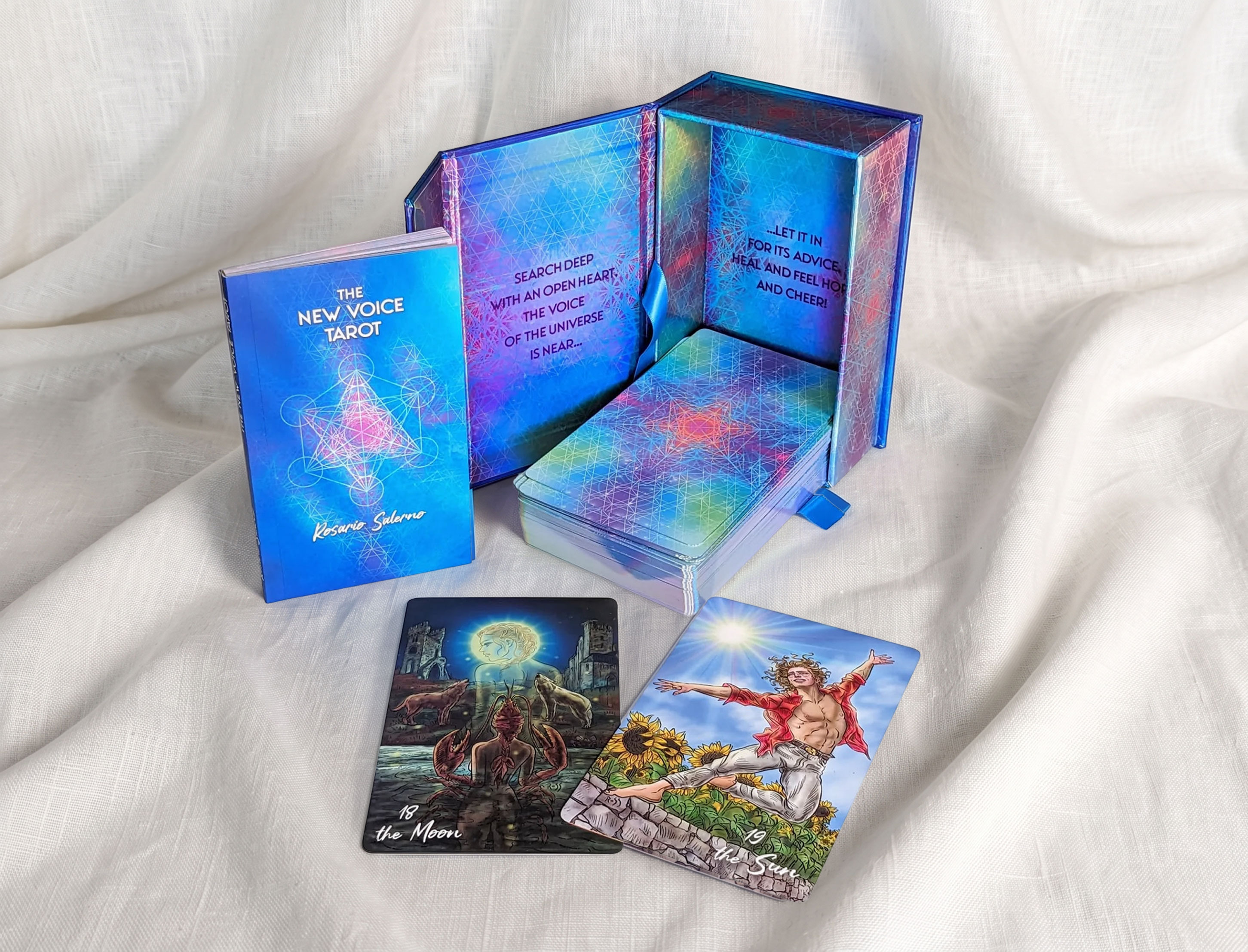 New Choice Tarot box, guidebook, and cards on white cloth